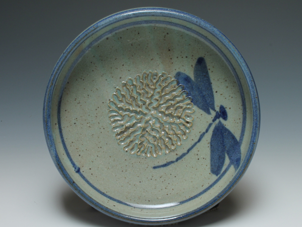 Dipping dish with garlic grater top view shown in Dragonfly