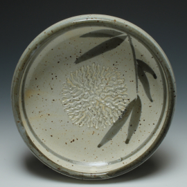 Dipping dish with garlic grater top view shown in Leaf