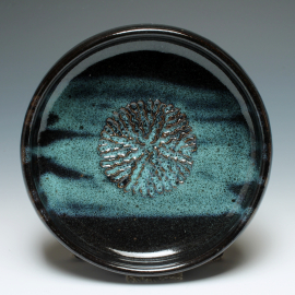 Dipping dish with garlic grater top view shown in Northern Lights